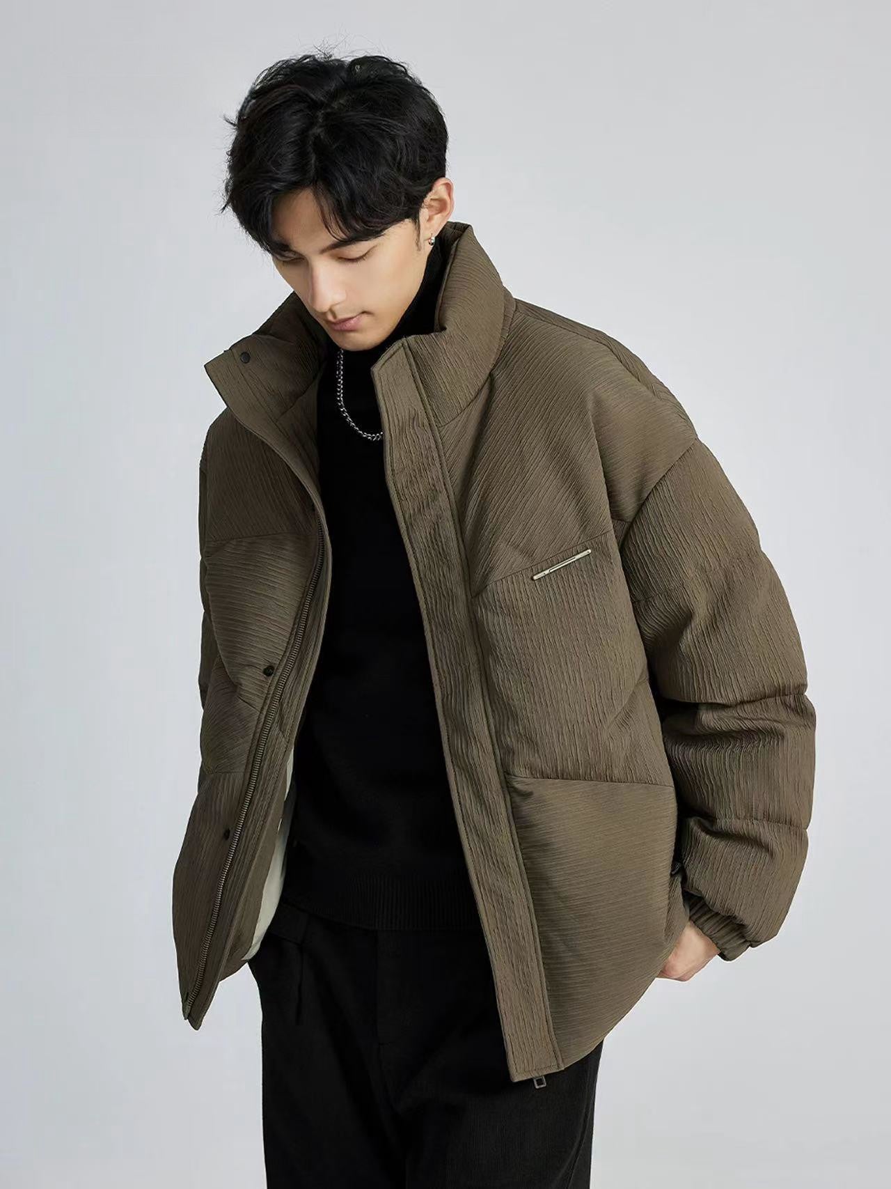 Warm textured down jacket with stand up collar and thick coat